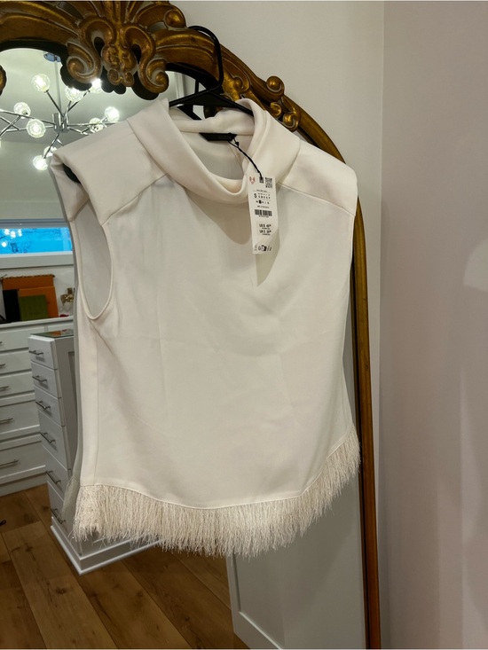 Zara Tops - Zara Ivory Sleeveless Fringe Hem Top